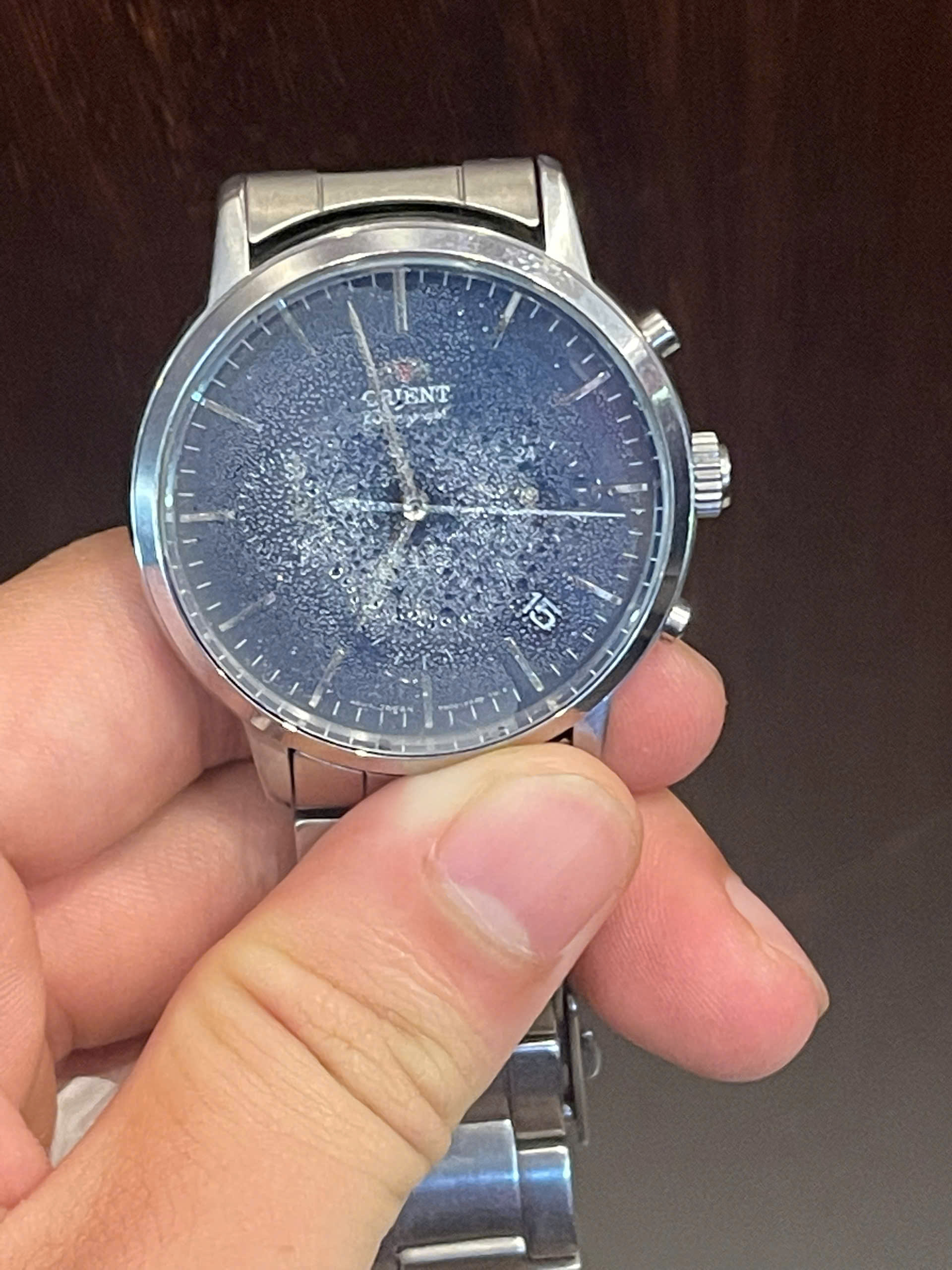 sửa đồng hồ bị vào nước