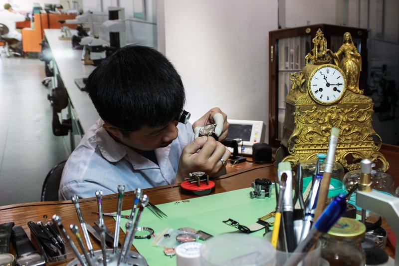 Sửa đồng hồ treo tường cổ